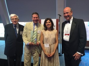 Accepting the Stephen Barr trophy for Ann Marsh, her editor Scott Wenger. From left, Stephen Barr’s father Charles Barr, Wenger, Stephen’s sister Vivienne Braun, and award presenter Roy Harris.